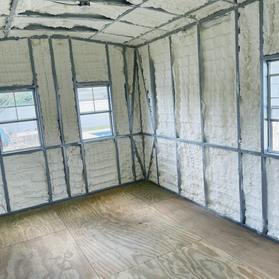Closed-cell spray foam insulation applied to wall cavities in a residential project in Augusta